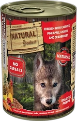 Blik hondennatvoer Natural Greatness Puppy Kip & Wortel met afbeelding van puppy-wolf en productetiket.