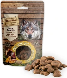 Natural Greatness Oven Baked hondensnacks met wolvenlabel en losgelegde biscuits Verpakt zakje Natural Greatness hondensnacks met een wolvenkop en losgelegde krokante biscuitjes naast de verpakking